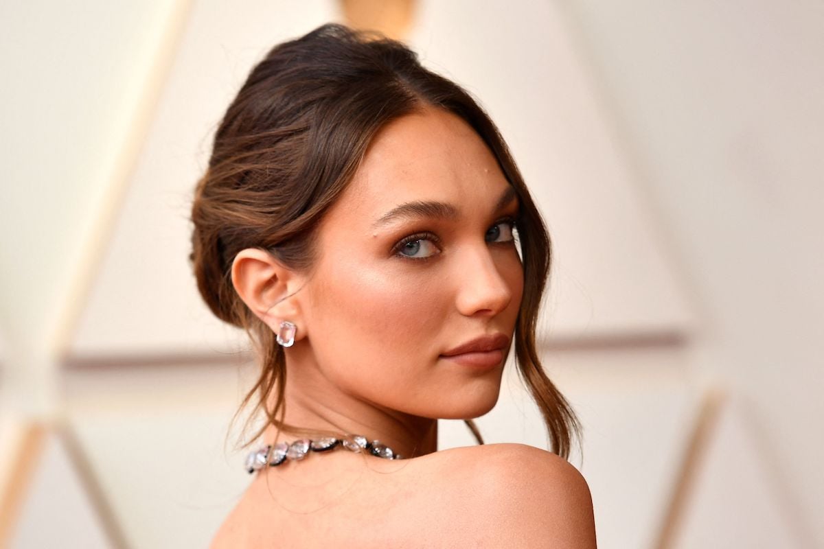 Bloody Hell star Maddie Ziegler looks over her shoulder