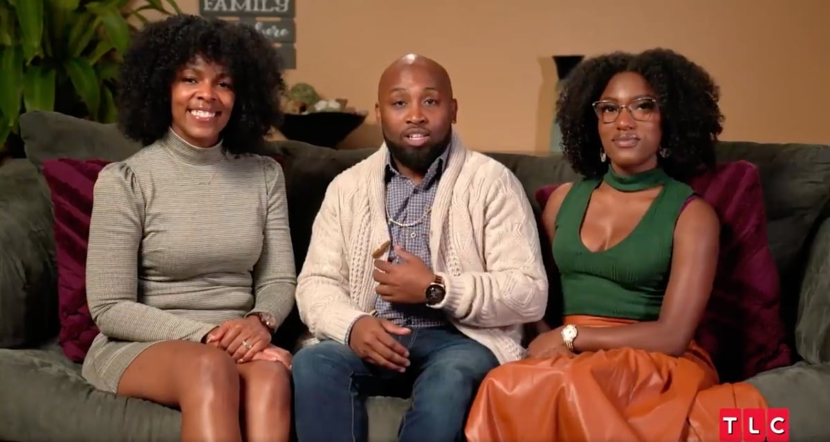From left to right, Taryn, Marcus, and India Epps sitting on a couch togehter during the filming for 'Seeking Sister Wife' Season 4 on TLC.