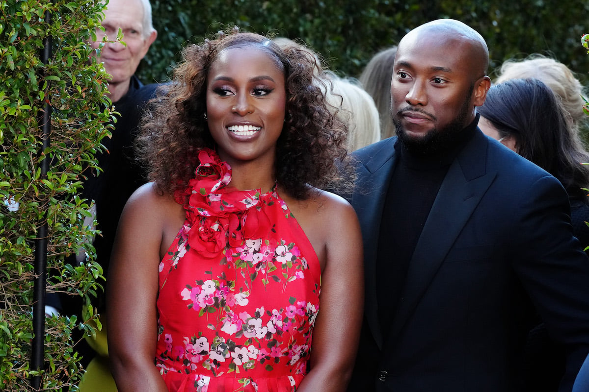 Issa Rae and Louis Diame walk the red carpet together at the 2022 Critics Choice Awards