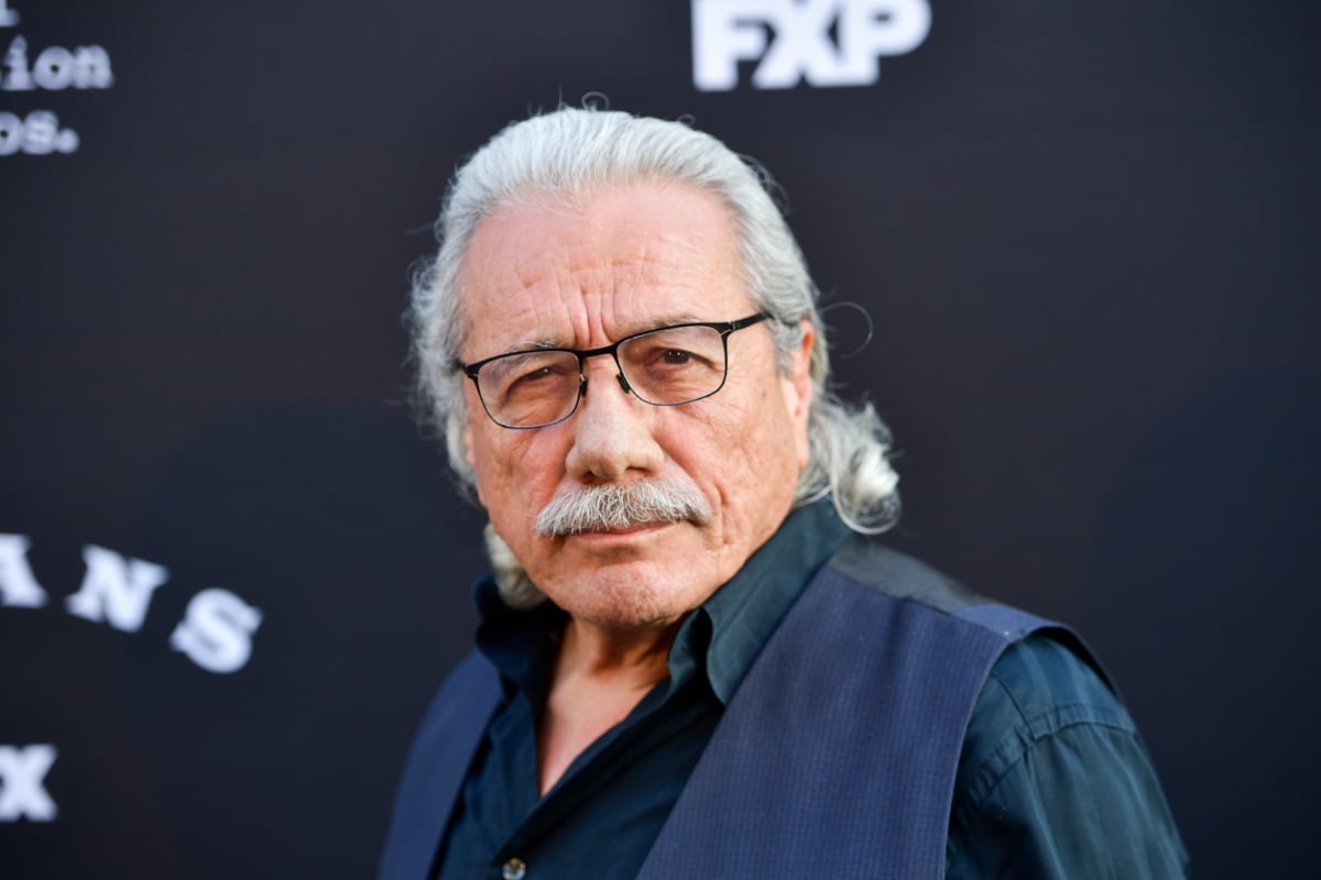 Mayans MC Season 4 actor Edward James Olmos wears a blue shirt and vest. 