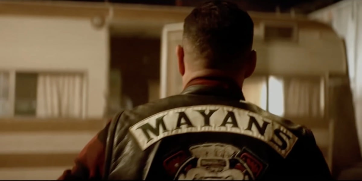 JD Pardo as EZ Reyes in Mayans MC Season 4. EZ has his back to the viewers and wears his Mayans MC kutte. 