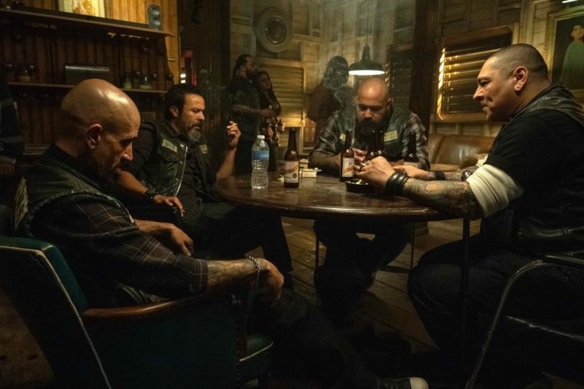 What will happen in Mayans MC Season 5. Creeper, Bishop, Gilly, and Hank sit around a table at the Santo Padre clubhouse.