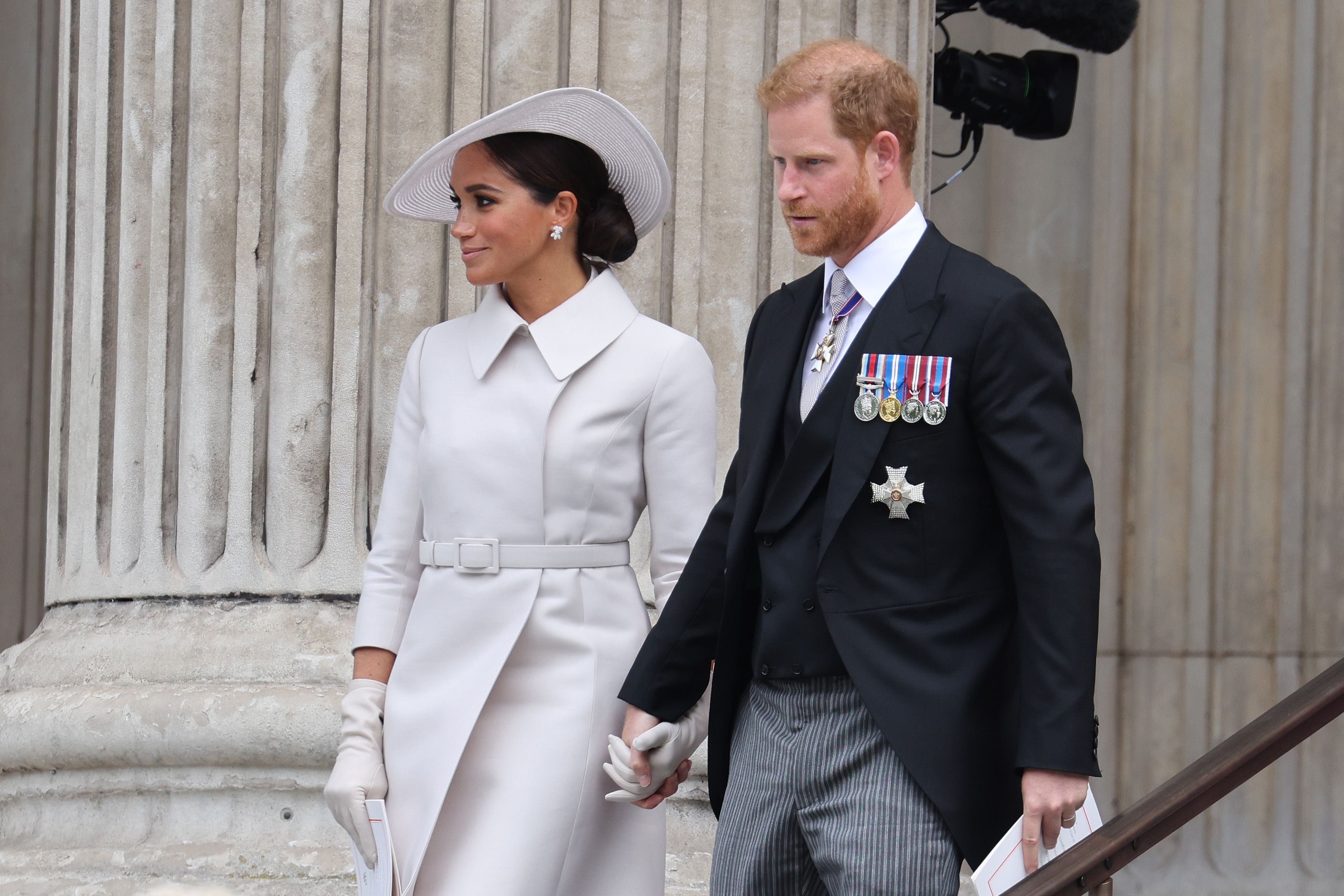 Meghan Markle and Prince Harry, who have to answer to Netflix about boos during Jubilee visit, leaving church after service of thanksgiving
