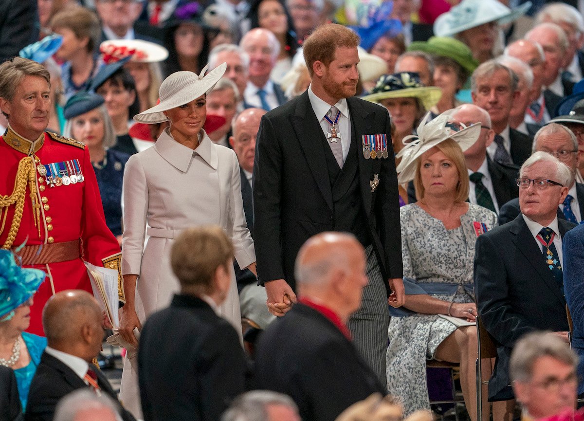 Meghan Markle and Prince Harry, who are now being put to the test after Platinum Jubilee weekend, according to a commentator, look on as they walk up the aisle at St. Paul's Cathedral