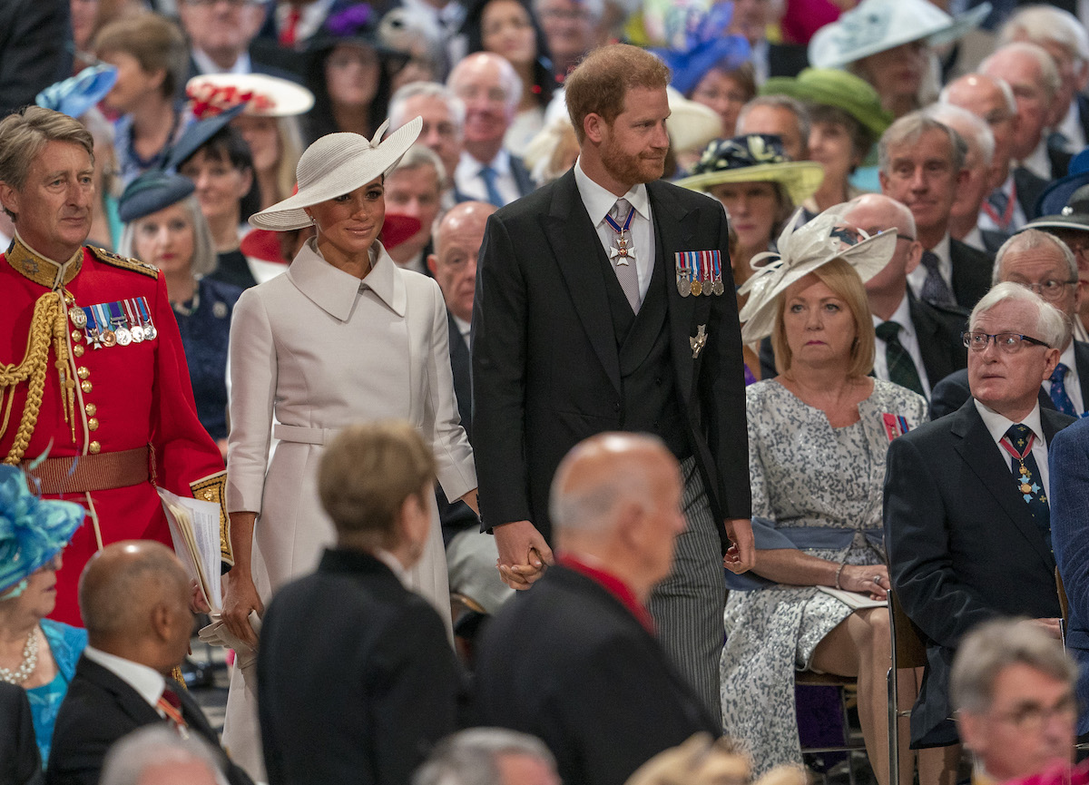 Meghan Markle and Prince Harry, who are now being put to the test after Platinum Jubilee weekend, according to a commentator, look on as they walk up the aisle at St. Paul's Cathedral