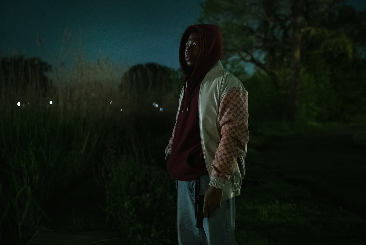 Mekai Curtis as Kanan Stark wearing a hoddie and jacket in 'Power Book III: Raising Kanan'