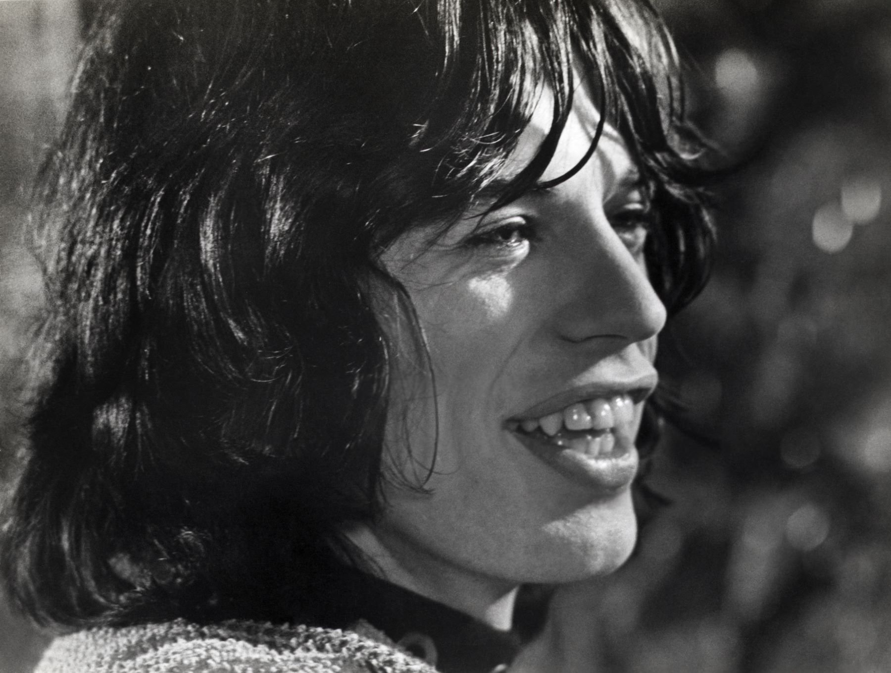 Mick Jagger giving a toothy smile circa 1963-1970