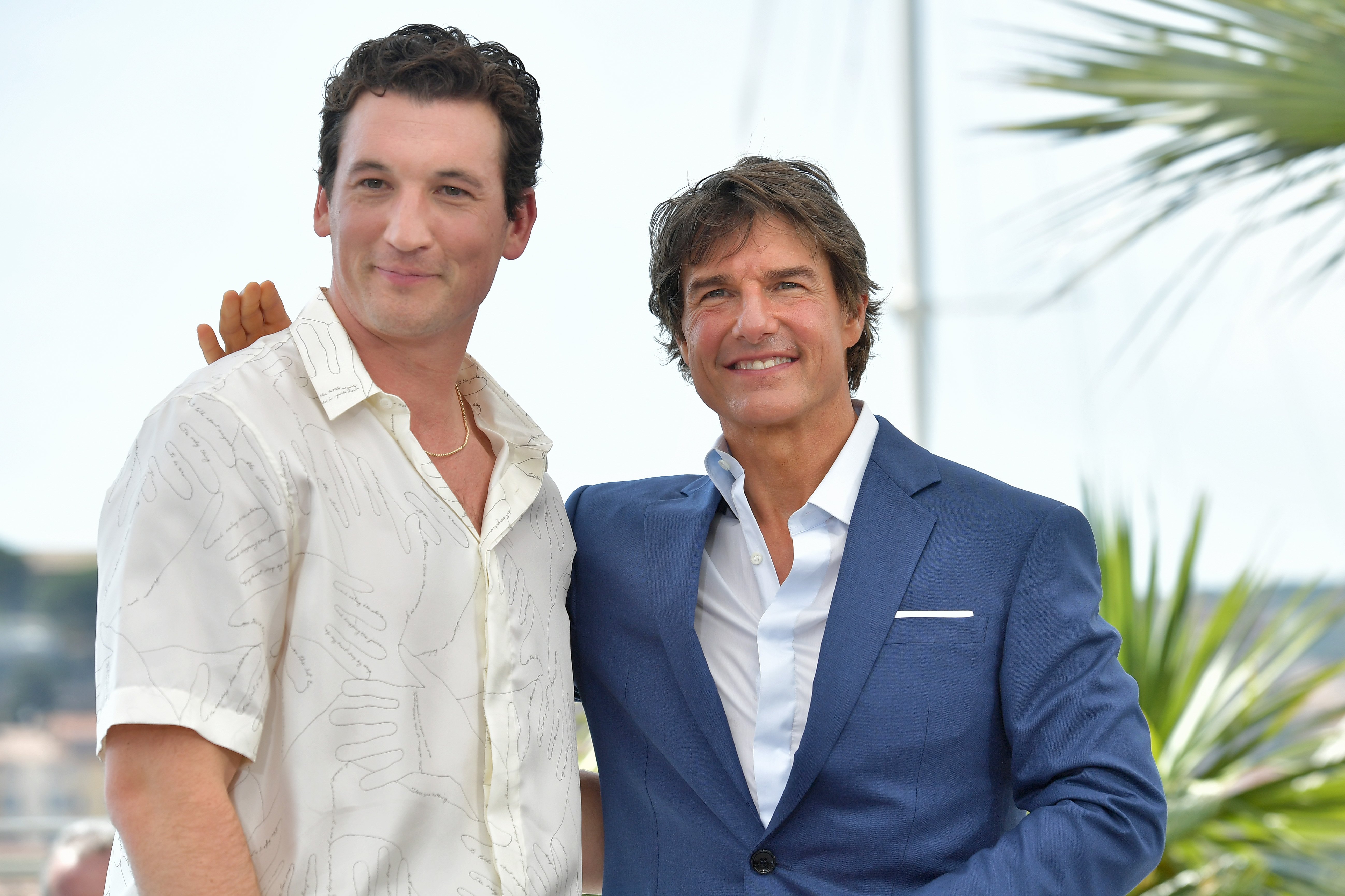 Miles Teller and Tom Cruise attend the photocall for 'Top Gun: Maverick' at the 75th annual Cannes film festival
