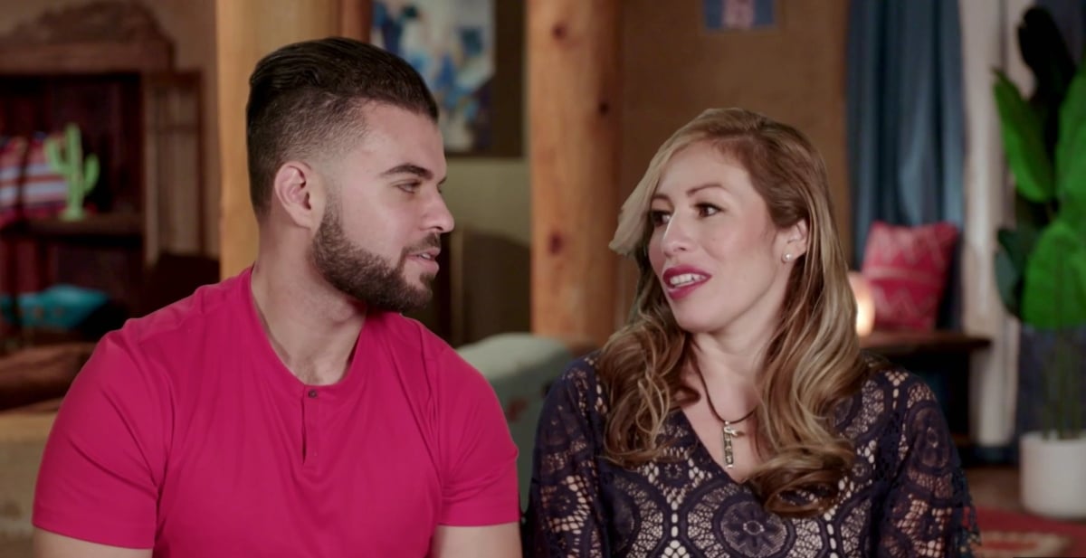 Mohamed and Yve sit together during an interview on '90 Day Fiancé' Season 9.