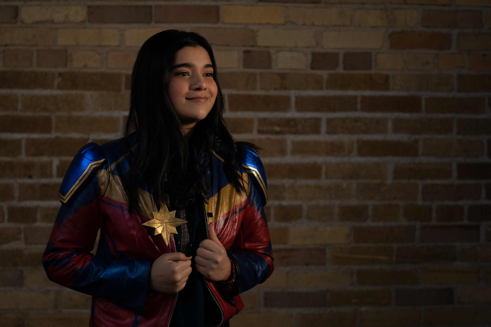 Iman Vellani, who fights the Djinn as Kamala Khan in 'Ms. Marvel' Episode 3, wears her character's Captain Marvel jacket.