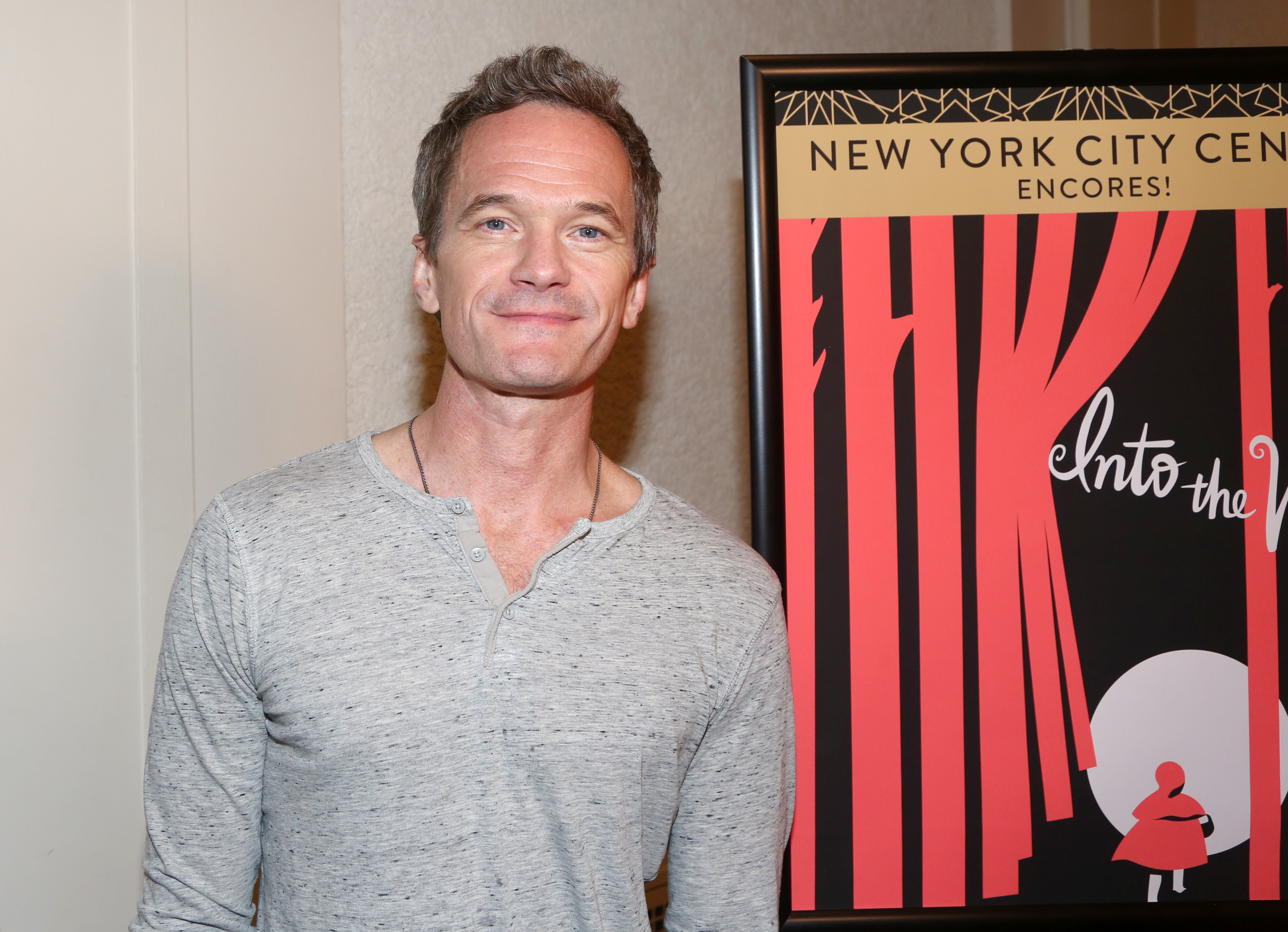 Neil Patrick Harris, who just sold his Harlem home, smiles for photo during the New York City Center Encore's 'Into the Woods' press day.
