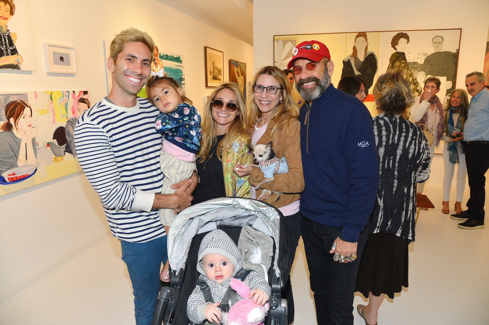 Nev Schulman, Cleo, Beau, Laura Perlongo, Ami Schulman and Robert Schulman attended an art show in 2019