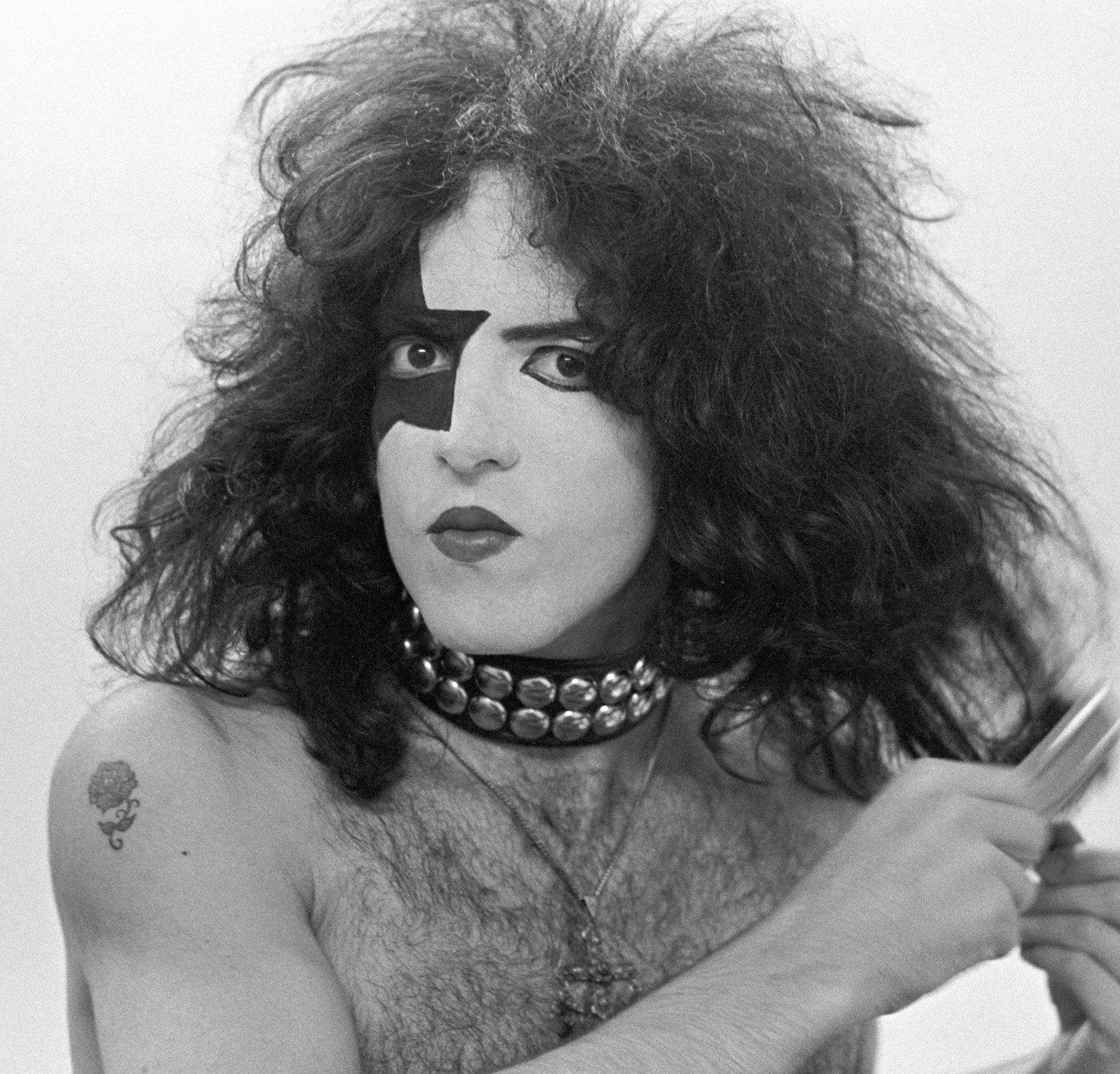 Kiss' Paul Stanley wearing a collar