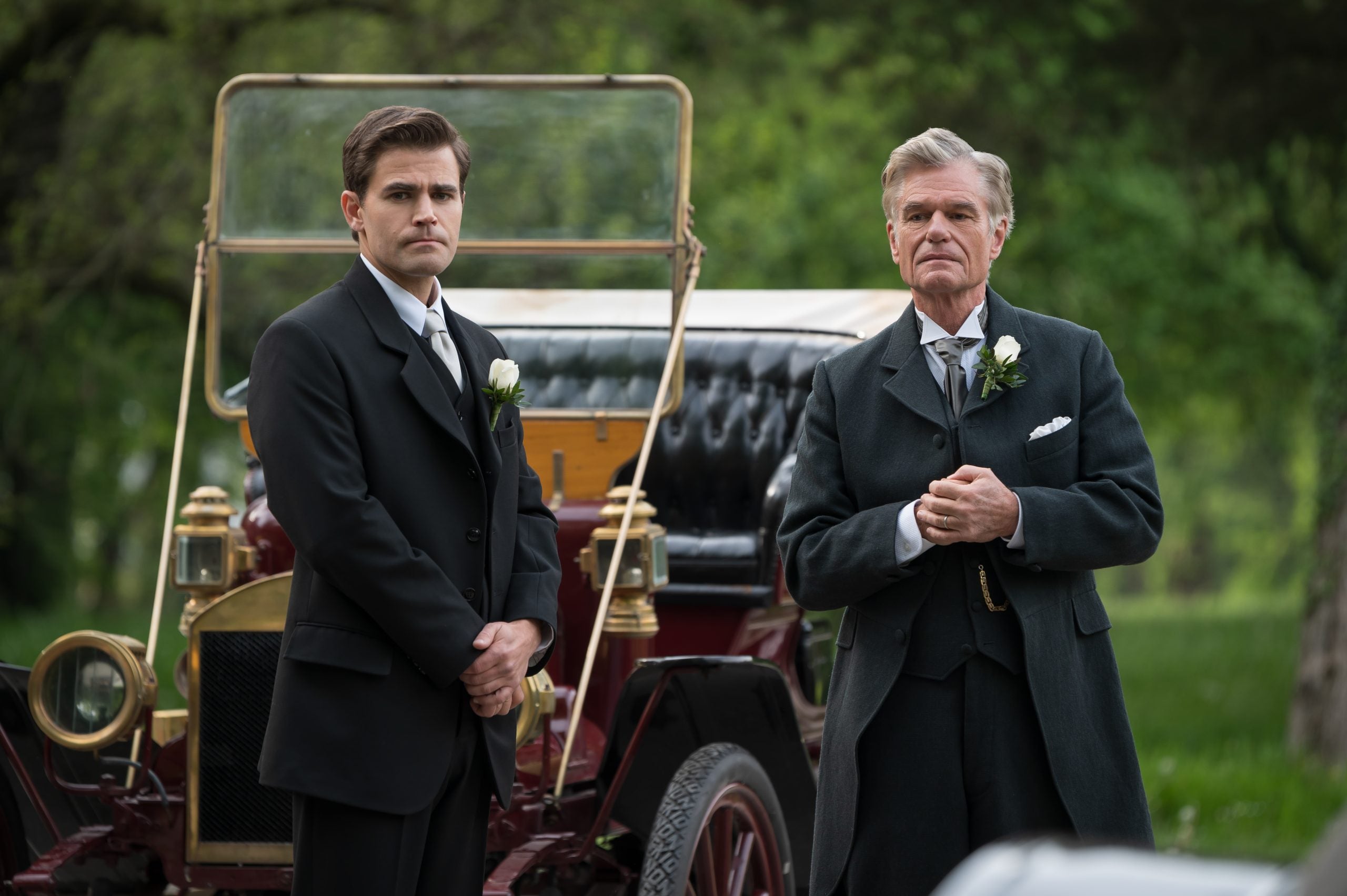 Paul Wesley and Harry Hamlin standing in front of a car in 'Flowers in the Attic: The Origin'