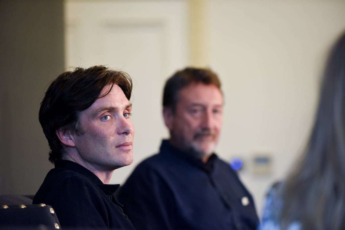Tommy Shelby visits Miquelon Island in Peaky Blinders Season 6. In this photo, Cillian Murphy sits in front of Steven Knight. 