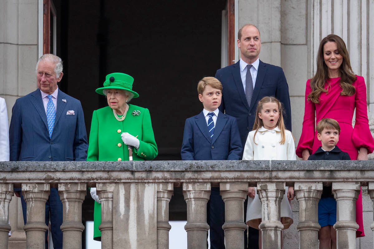 Prince Charles, Queen Elizabeth II, Prince George, Prince William, Princess Charlotte, Prince Louis, and Kate Middleton stand on the balcony during Platinum Jubilee weekend