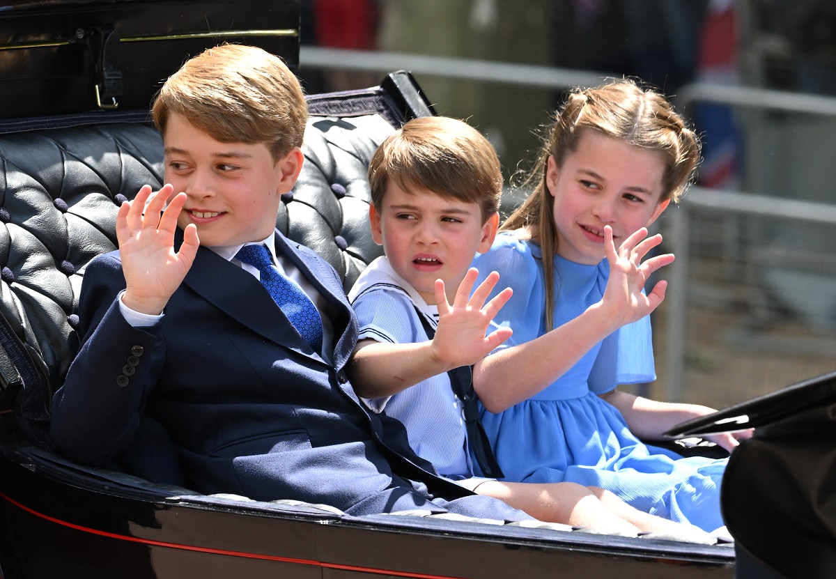 Prince George, Prince Louis, and Princess Charlotte riding in a carriage at Trooping the Colour