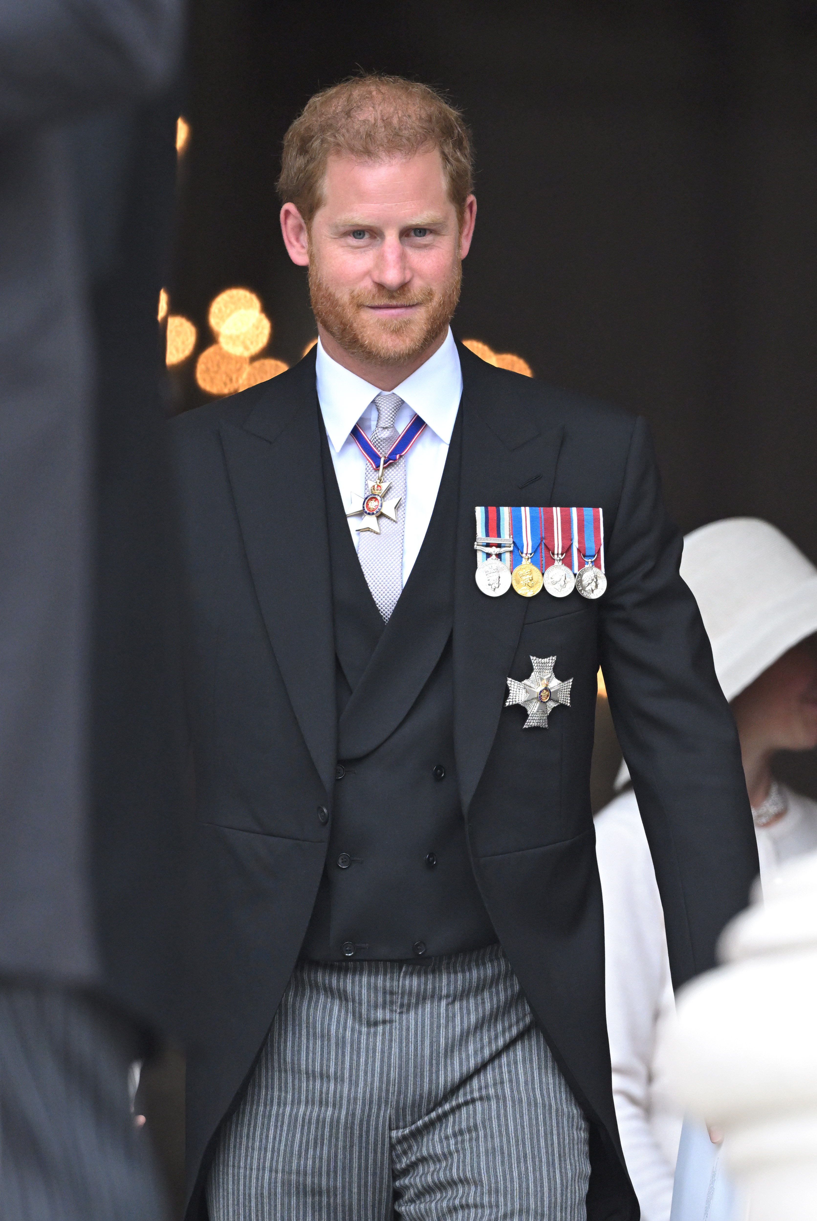 Prince Harry smiling slightly after the National Service of Thanksgiving