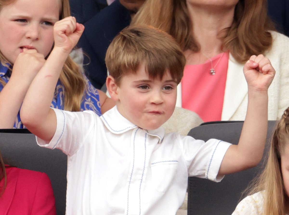 Prince Louis, whose jubilee pageant antics were credited to sugar, raises his hands above his head