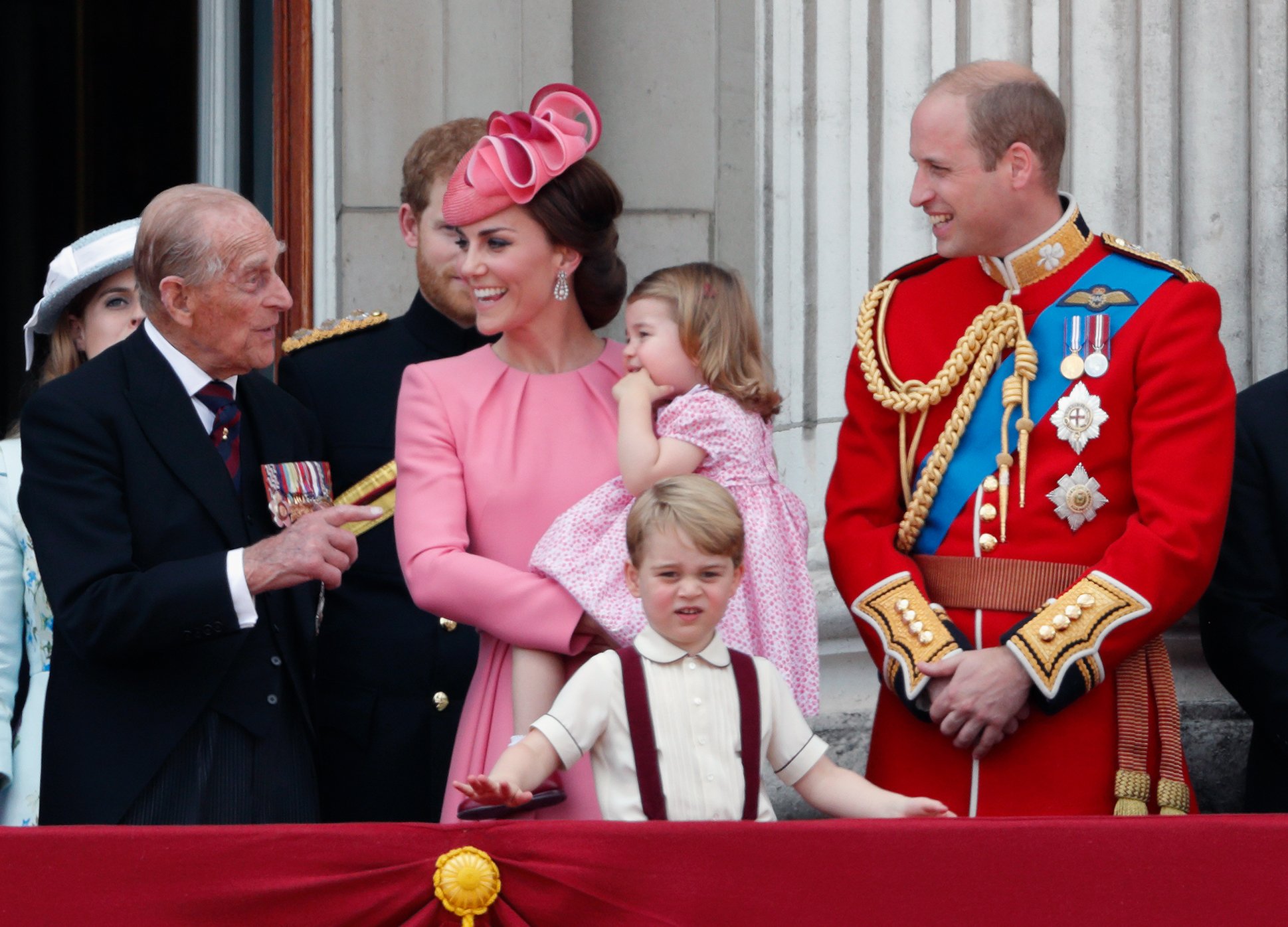 Prince Philip, who had a connection Kate Middleton's family, talking to her and Prince William while standing on the Buckingham Palace balcony in 2017