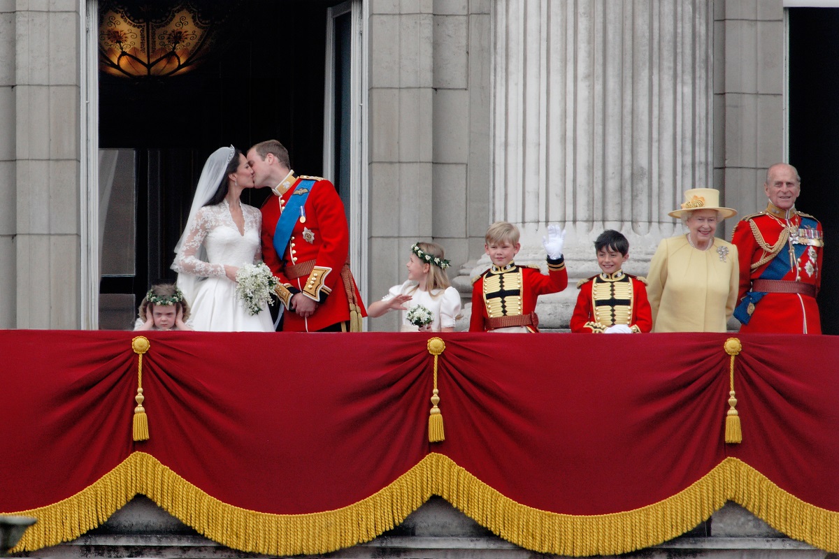 Prince William and Kate Middleton's Buckingham Palace balcony kiss with Queen Elizabeth II and Prince Philip nearby
