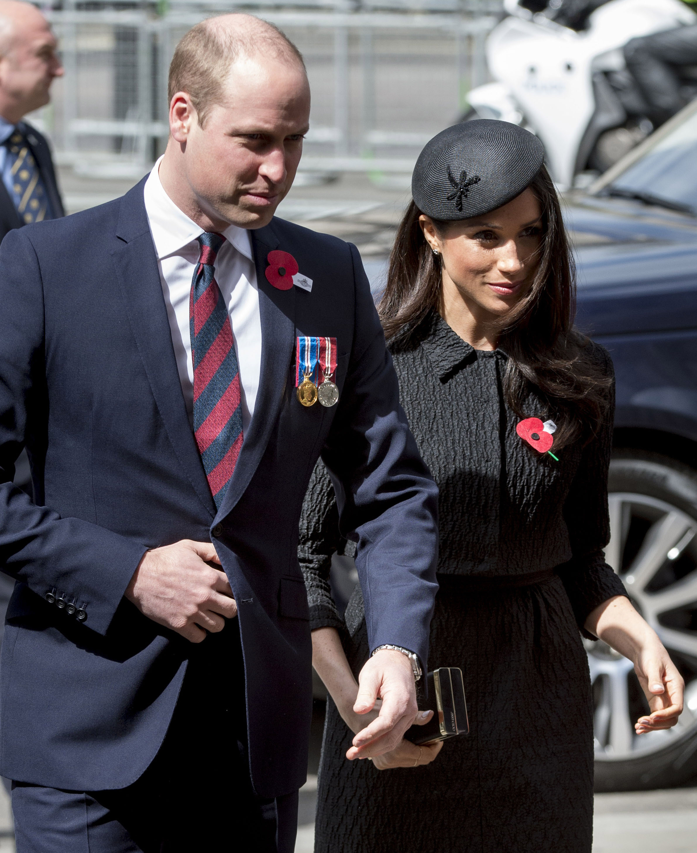 Prince William and Meghan Markle walking into Westminster Abbey for an Anzac Day service