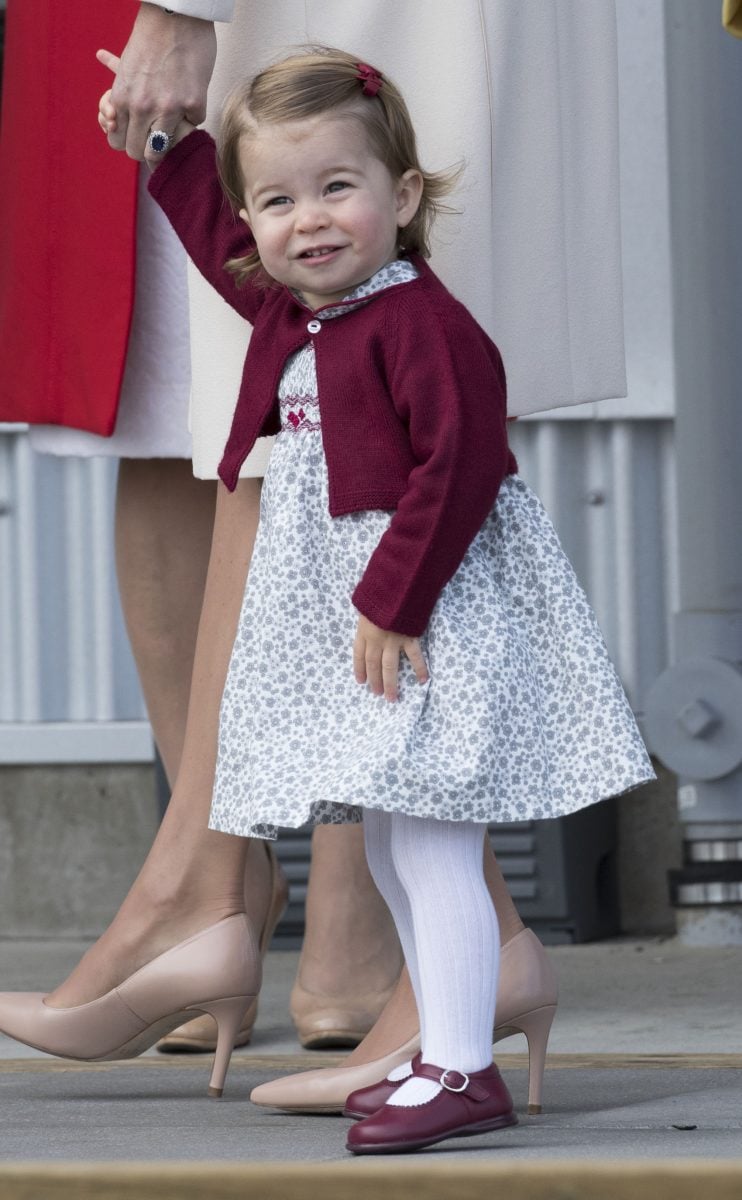 Princess Charlotte holding her mom's hand on the final day of their Royal Tour of Canada