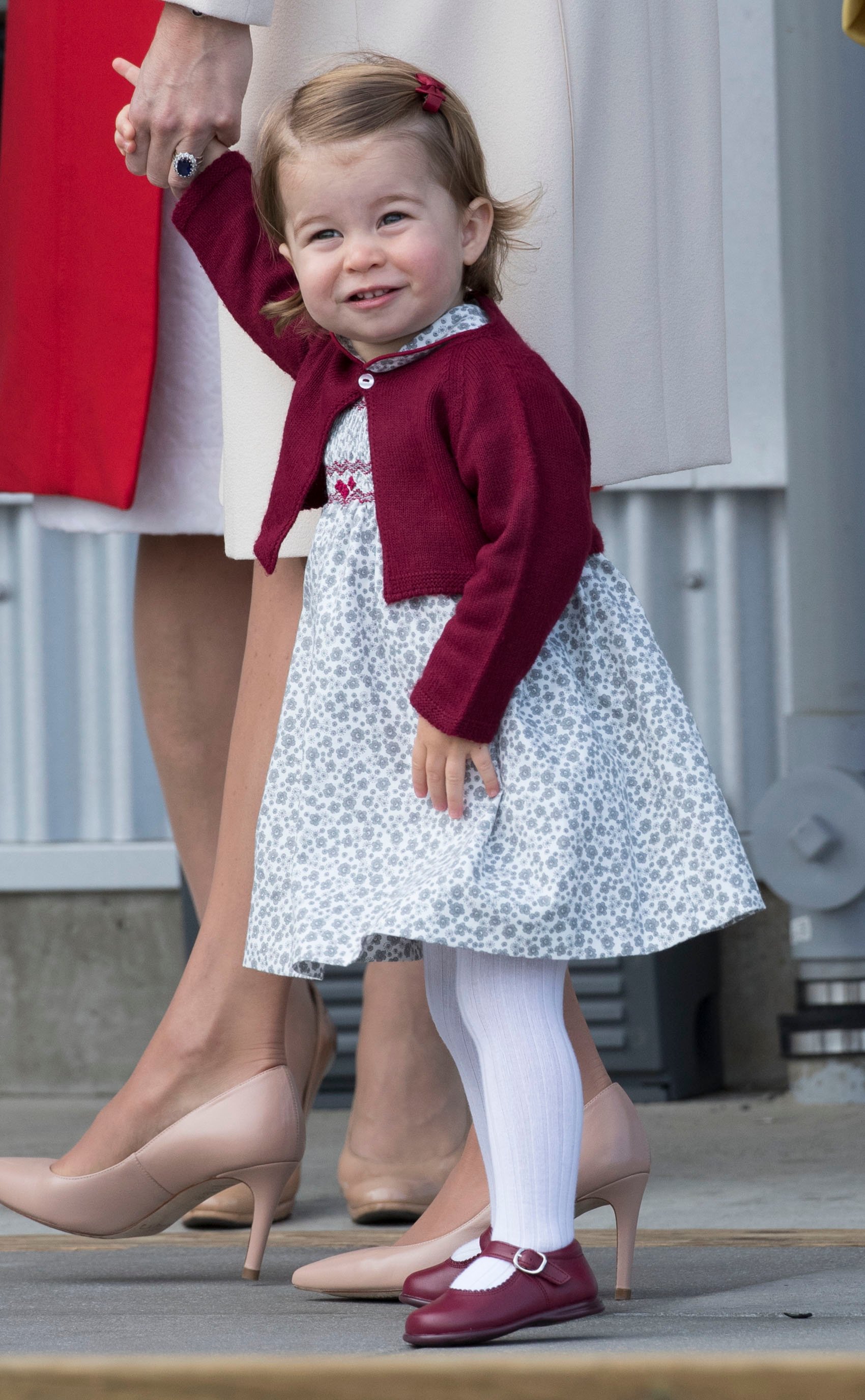Princess Charlotte holding her mom's hand on the final day of their Royal Tour of Canada
