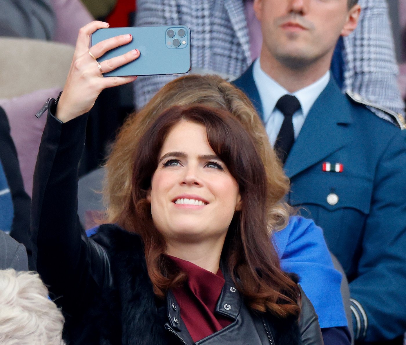 Princess Eugenie taking a selfie during the Platinum Jubilee Pageant