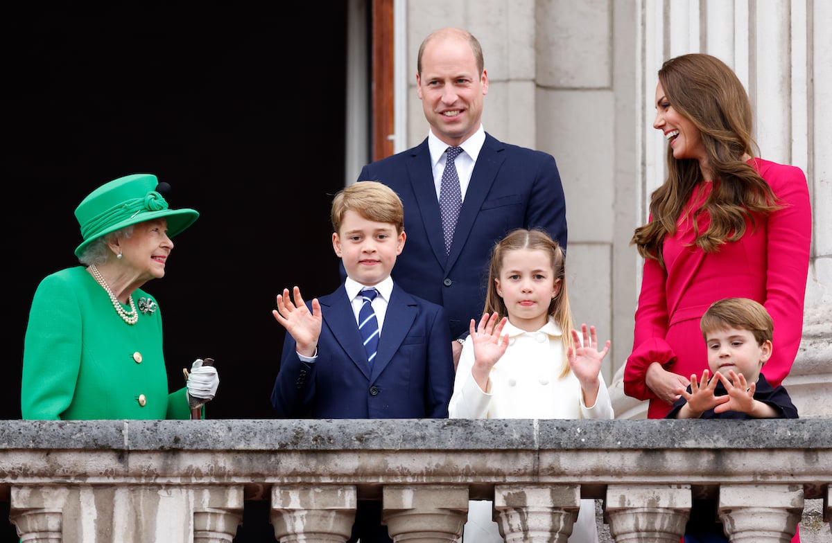 Queen Elizabeth II, who is reportedly hosting Prince William and Kate Middleton's 40th birthday party, stands with Prince William, Kate Middleton, and their children