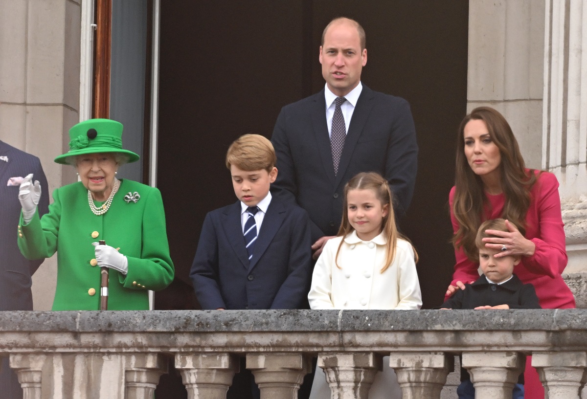 Queen Elizabeth II and the Cambridge family standing on the balcony during the Platinum Pageant 