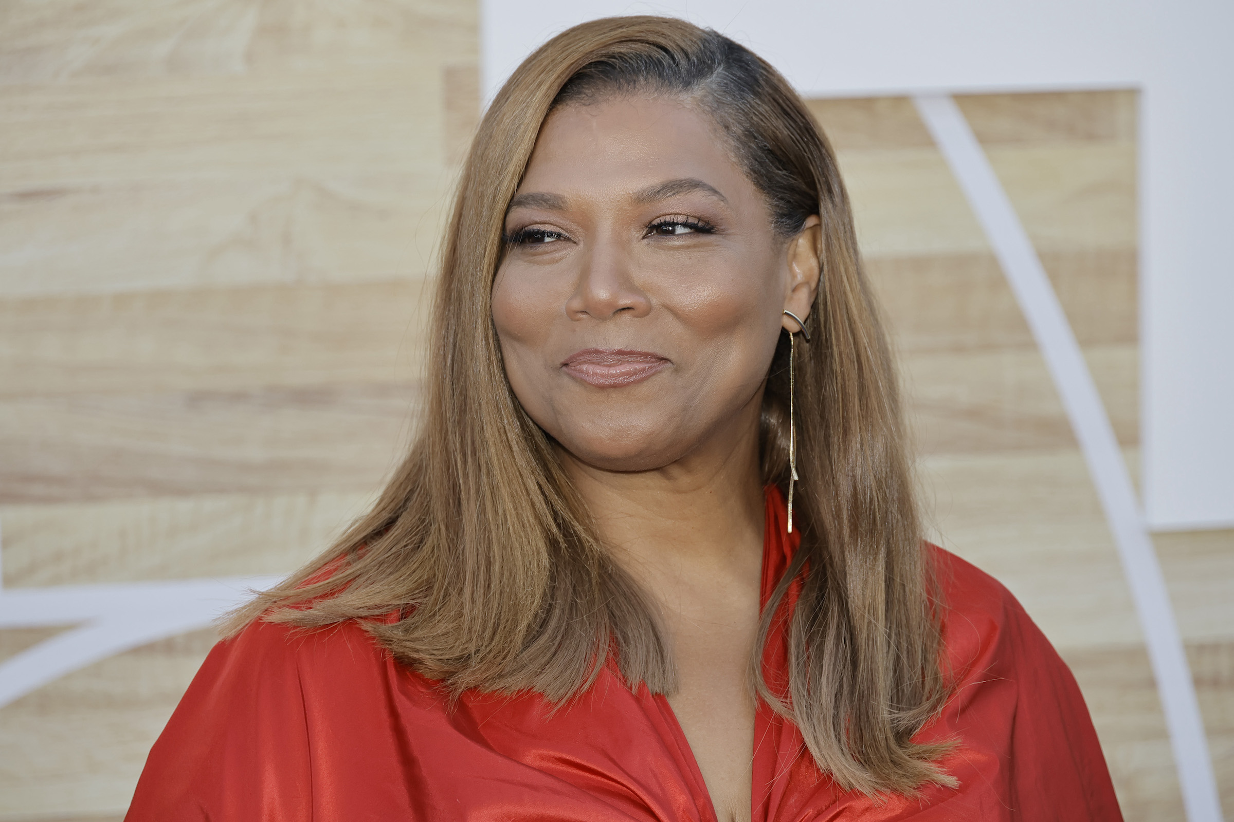 Queen Latifah, a rapper like Tupac Shakur, posing for a photo