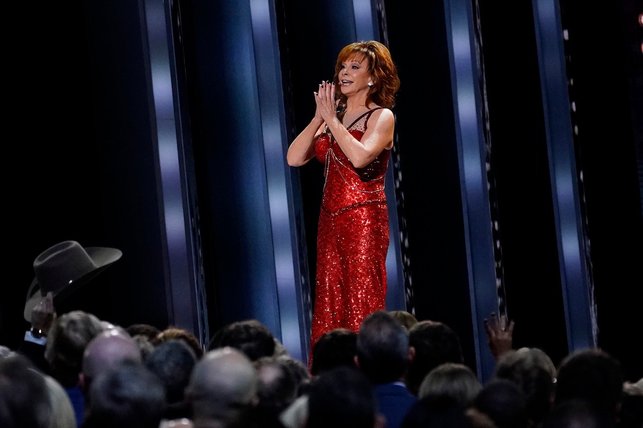 Reba McEntire, shown performing at the CMA Awards in 2019, credits her career to her faith
