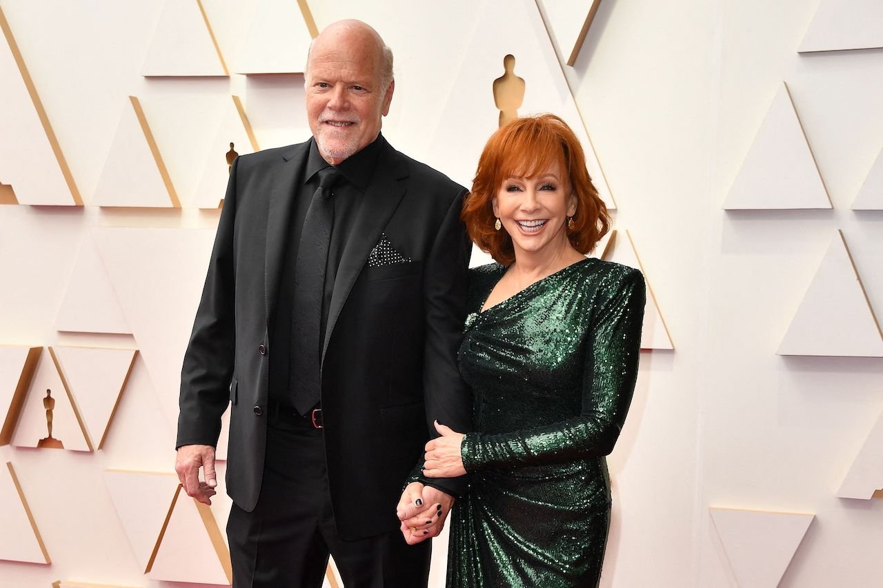 Reba McEntire and Rex Linn, shown at the 94th Oscars, bonded over their shared faith