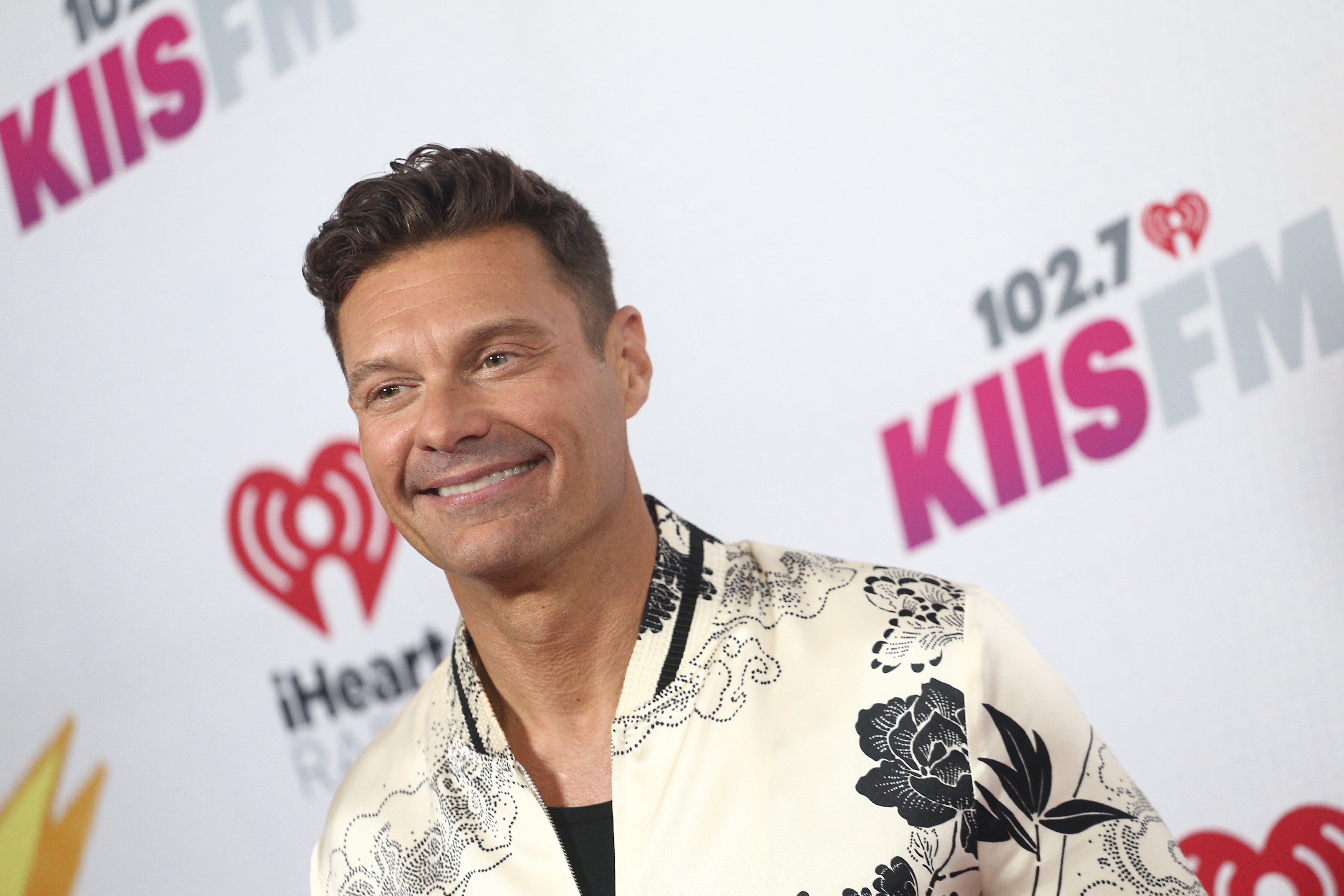 Ryan Seacrest, who rents a Manhattan home for $75,000 a month, smiles on the carpet at the 2022 iHeartRadio Wango Tango