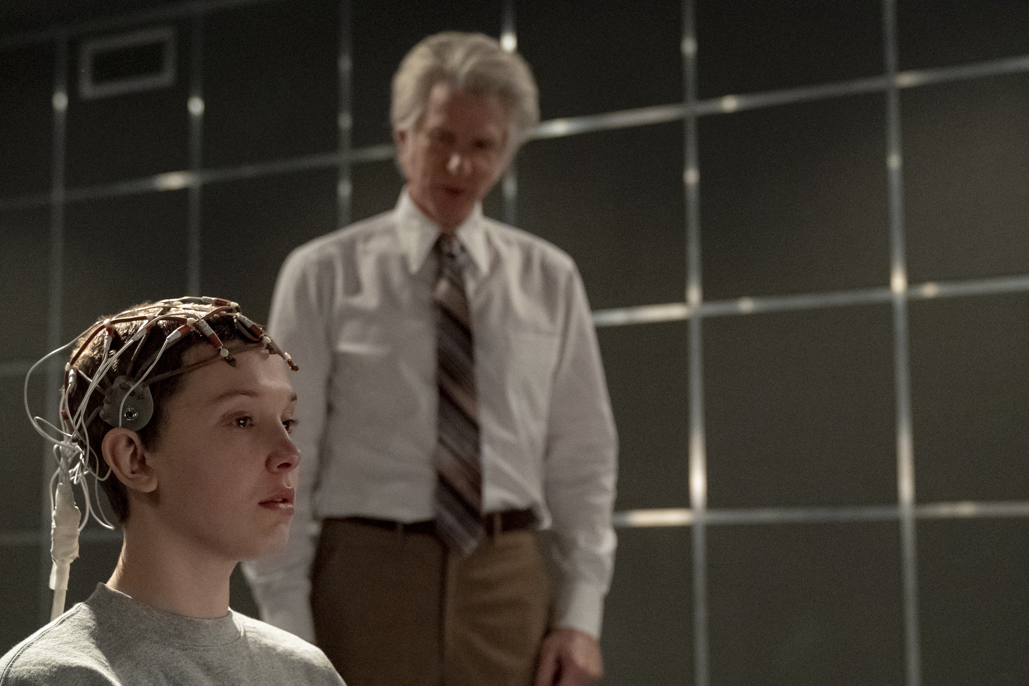 'Stranger Things 4' character Dr. Brenner looking at Eleven in the lab.
