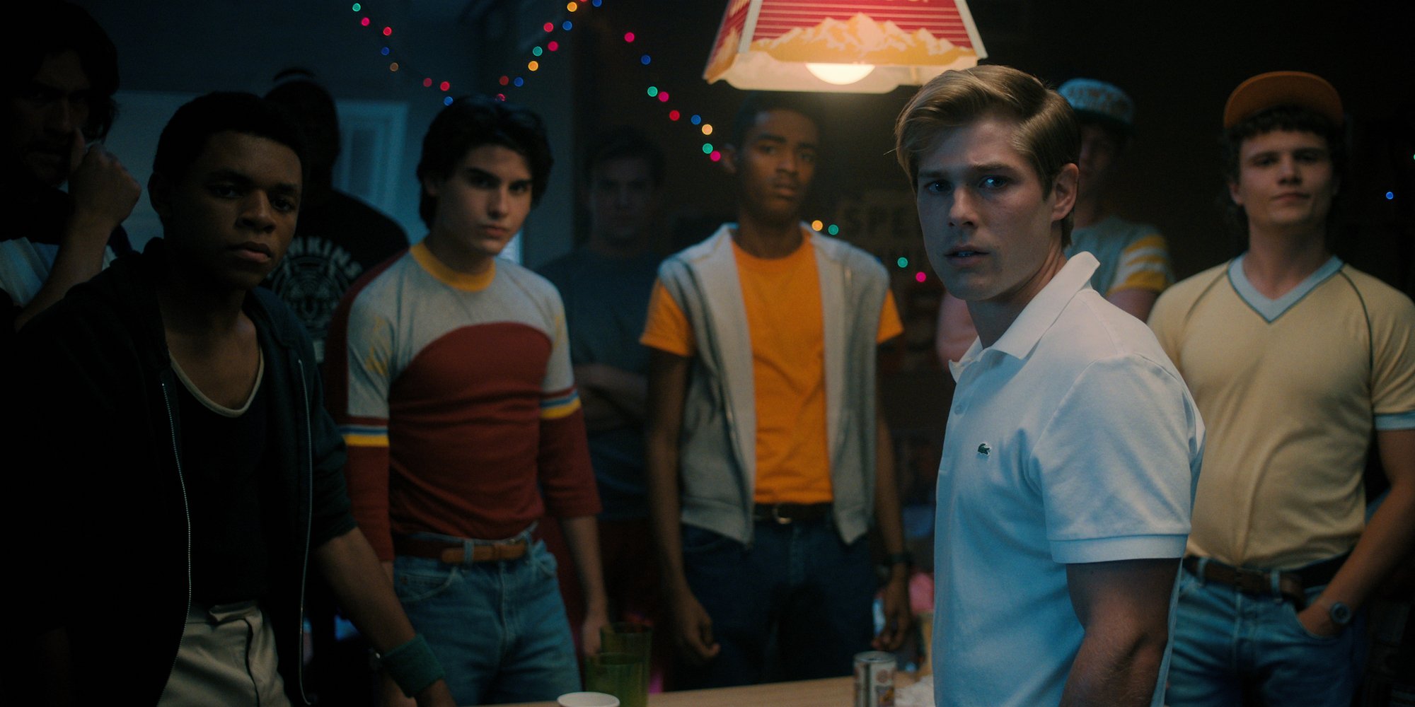 'Stranger Things 4' star Mason Dye as Jason Carver, standing with teammates before they decide to hunt down Eddie Munson.