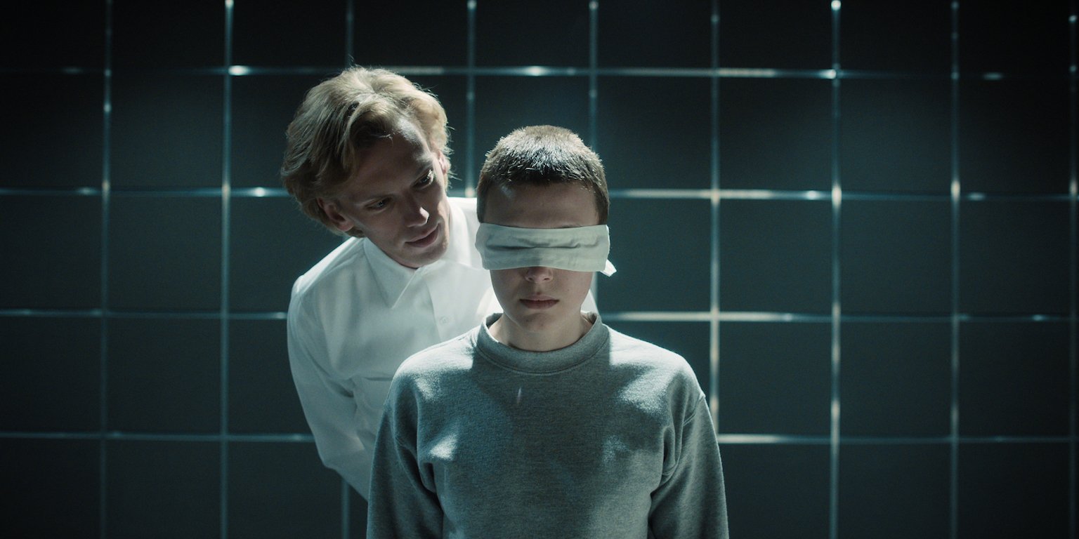 Peter Ballard speaking to a blindfolded Eleven in 'Stranger Things' Season 4 Volume 1