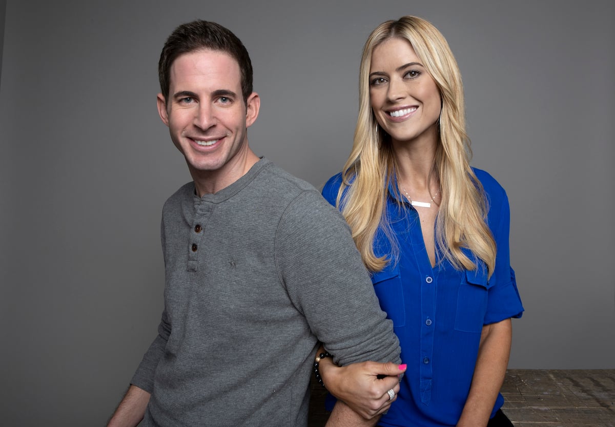 Tarek El Moussa and Christina Haack smile and pose together.