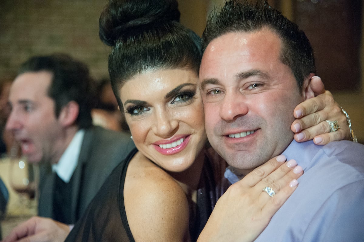 Teresa Giudice smiling and hugging then-husband Joe Giudice