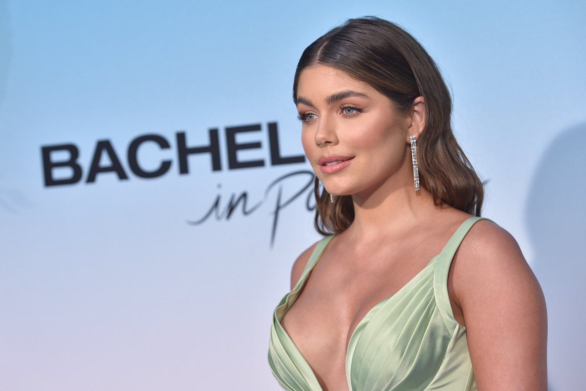 'The Bachelor' star Hannah Sluss wearing a light green formal dress.