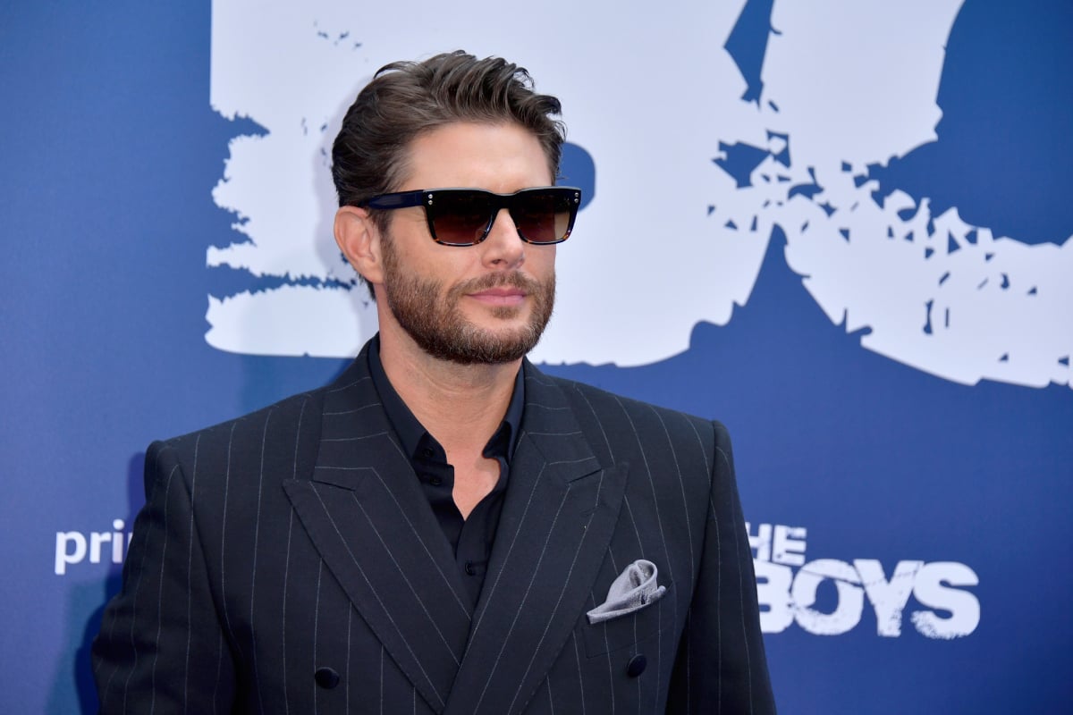 Jensen Ackles attends the The Boys Season 3 special screening wearing sunglasses and a pinstriped suit. 