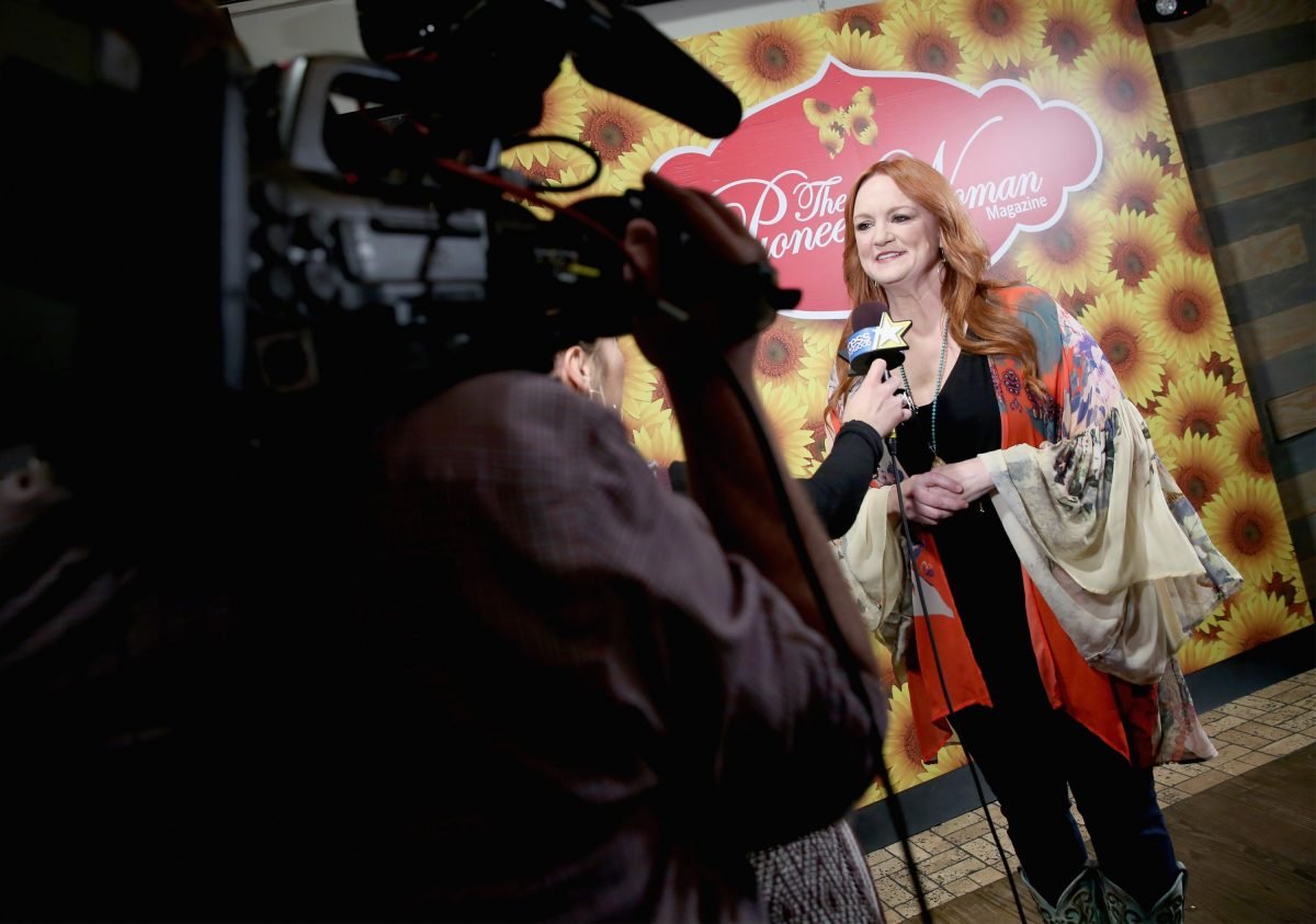 Celebrity chef Ree Drummond wears a black blouse while speaking on camera in this photograph.