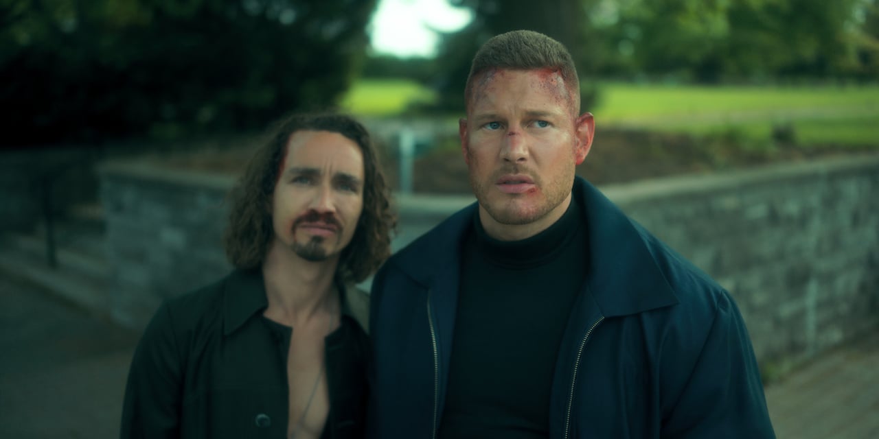 Robert Sheehan as Klaus Hargreeves and Tom Hopper as Luther Hargreeves in 'The Umbrella Academy'.