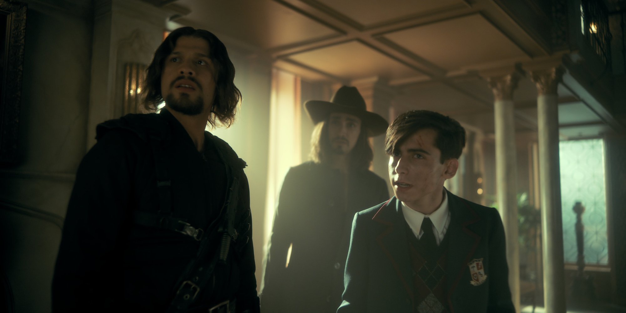 'The Umbrella Academy' Season 3 stars David Castañeda, Robert Sheehan, and Aiden Gallagher in a production still.