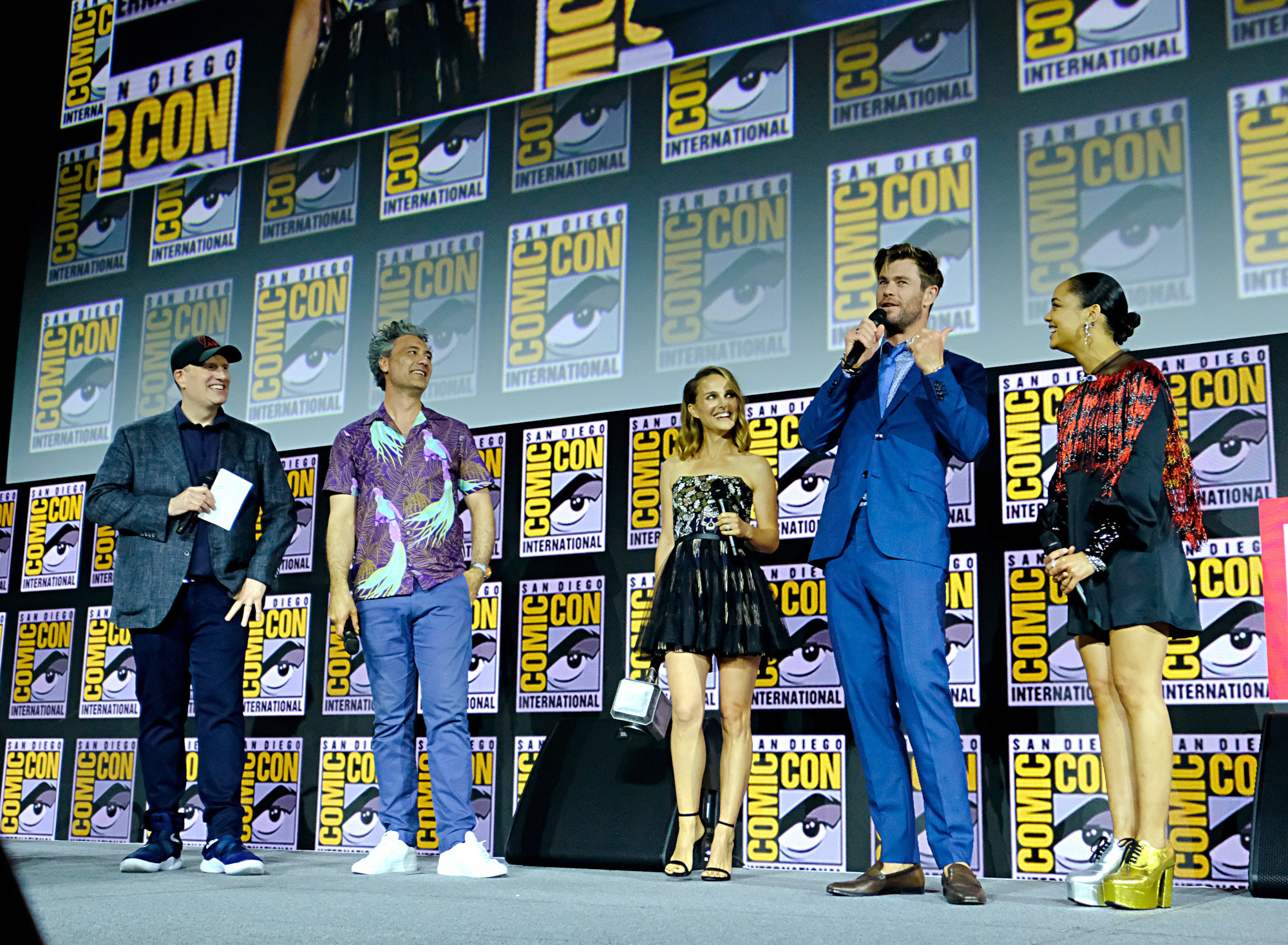 Kevin Feige, Taika Waititi, Natalie Portman, Chris Hemsworth, and Tessa Thompson at San Diego Comic-Con. They're promoting 'Thor: Love and Thunder,' which has a reported runtime of under two hours.