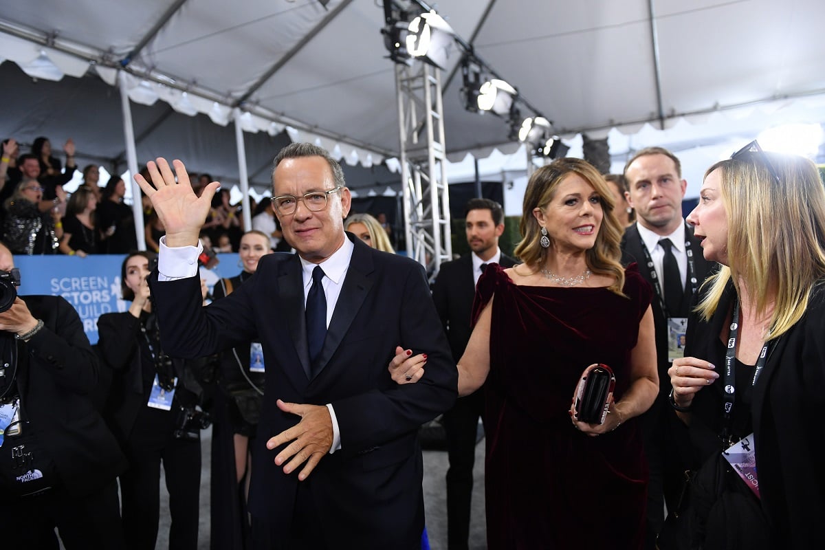 Tom Hanks smiling alongside Rita Wilson.