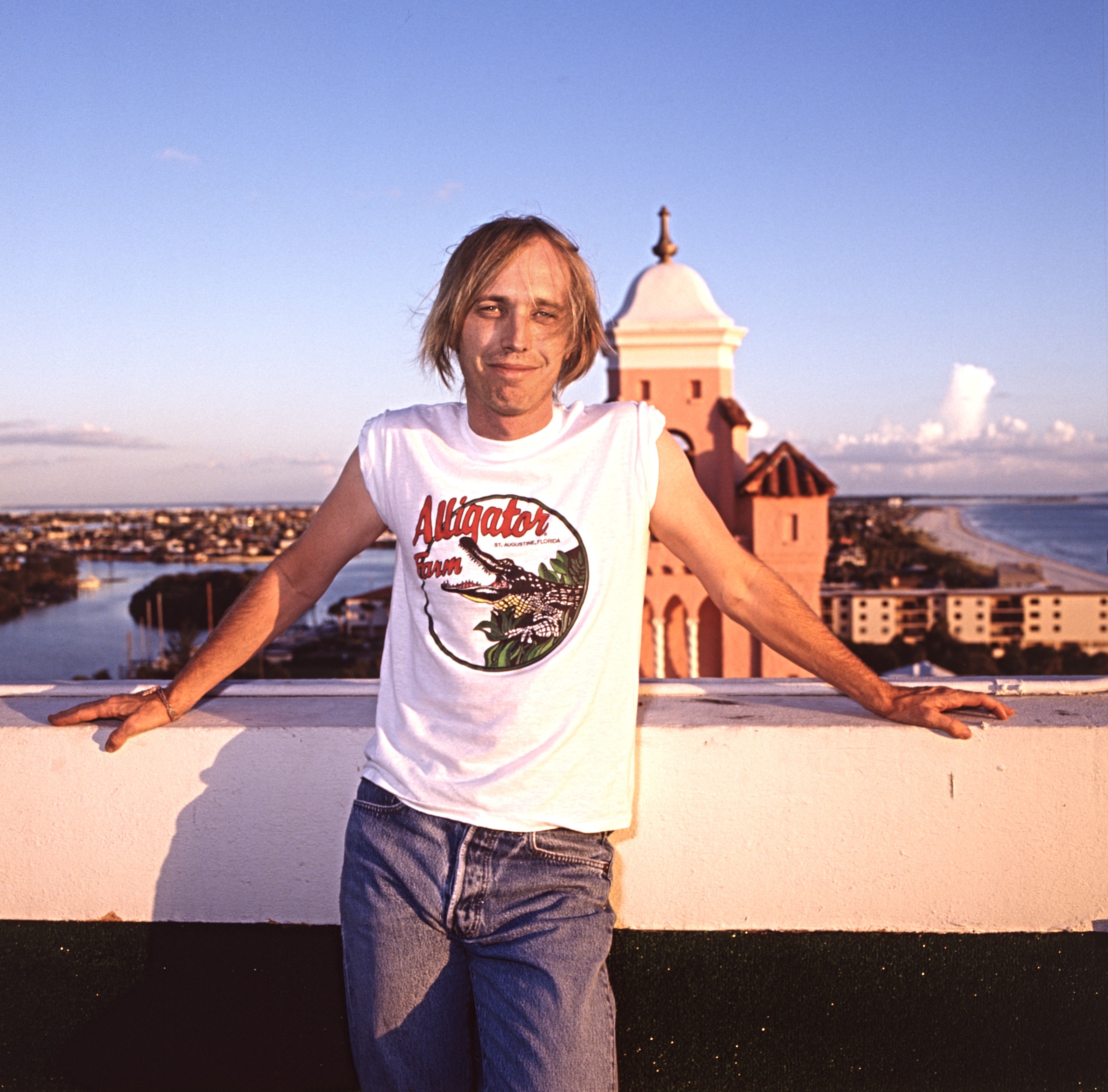 Tom Petty poses in front of a building in St. Petersburg, Florida.