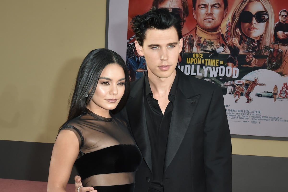 Vanessa Hudgens and Austin Butler pose together at an event.