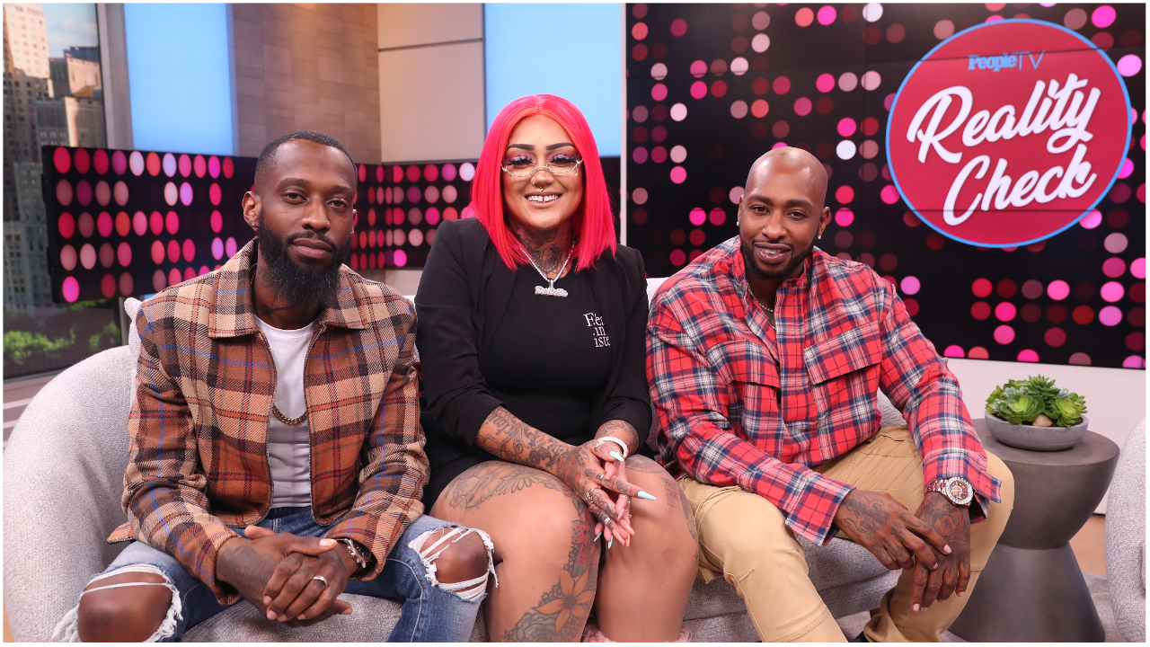 Walt Miller, Donna Marie Lombardi, and Ceaser Emanuel of Black Ink Crew New York sitting down on a couch next to each other on the set of Reality Check
